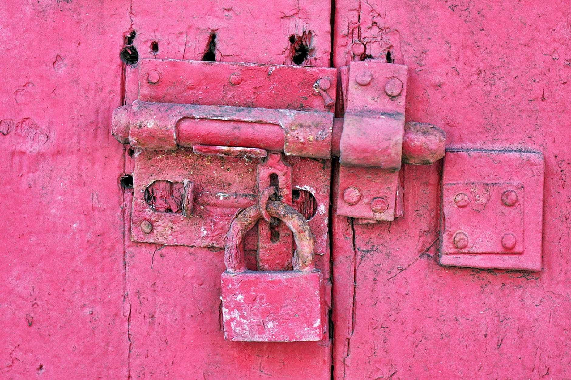 red metal padlock